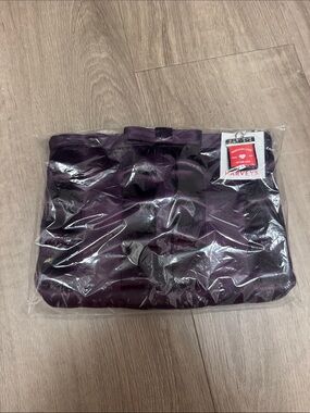 Harveys Plum Seatbelt Clutch with Front Bow. Lola clutch